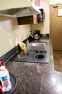 Merit Hotel & Suites