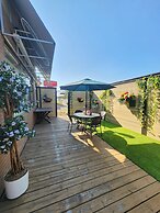 Merit Hotel & Suites