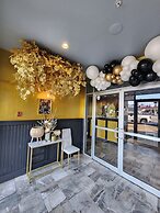 Merit Hotel & Suites