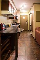 Merit Hotel & Suites