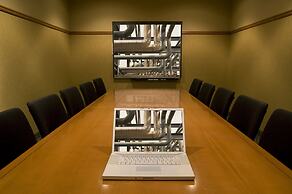 Merit Hotel & Suites