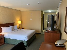 Merit Hotel & Suites