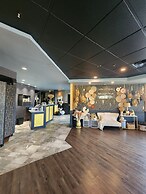 Merit Hotel & Suites