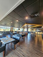 Merit Hotel & Suites