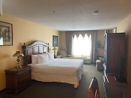 Merit Hotel & Suites