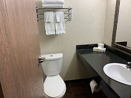 Merit Hotel & Suites