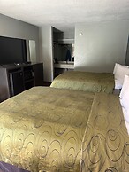 Clairmont Inn & Suites Warren