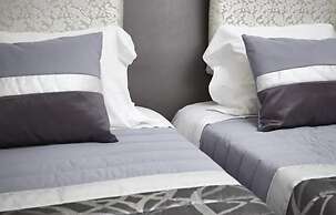 Welcome In - Suites & Hostel