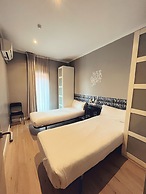 Fira Centric Apartments by gaiarooms