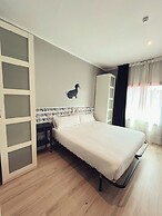 Fira Centric Apartments by gaiarooms