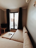 Fira Centric Apartments by gaiarooms