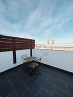 Fira Centric Apartments by gaiarooms