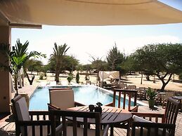 Campement Lodge Océan & Savane