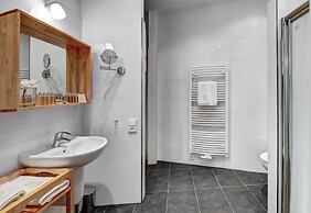 4 Arts Apartments by Adrez Living