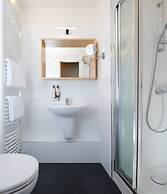 4 Arts Apartments by Adrez Living