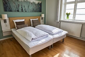 Sixtus Sinatur Hotel og Konference