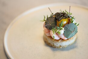 Sixtus Sinatur Hotel og Konference