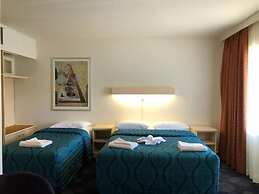 The Astor Hotel Motel