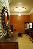 Amos Cozy Hotel & Convention Hall