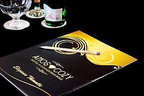 Amos Cozy Hotel & Convention Hall