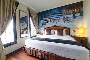 Amos Cozy Hotel & Convention Hall