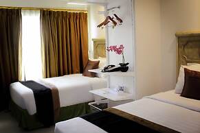 Amos Cozy Hotel & Convention Hall