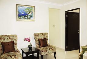 Amos Cozy Hotel & Convention Hall