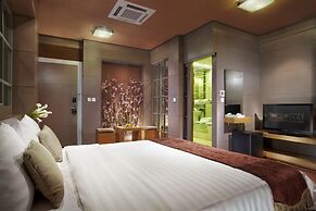 Amos Cozy Hotel & Convention Hall