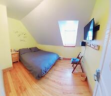 Auberge Le P'tit Bonheur - Hostel