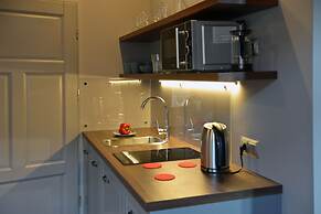 La Gioia Grey Stylish Apartments