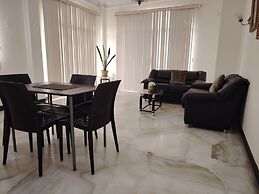 Del Sol Suites & Apartments