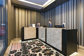 Louis Kienne Serviced Residences