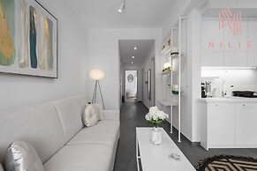 Lusso Bianco Nilie Hospitality MGMT