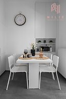 Lusso Bianco Nilie Hospitality MGMT