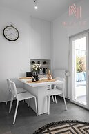 Lusso Bianco Nilie Hospitality MGMT