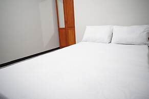 OYO Life 93045 Kost Putra Bu Ketut