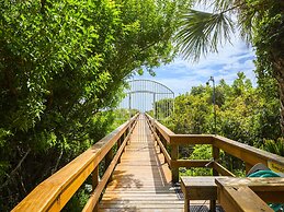 Beach & Tennis 217 by Distinctive Beach Rentals