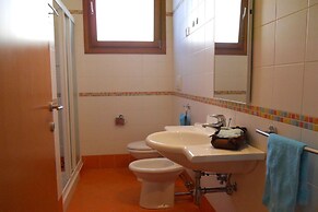 Colorful Apartment With Fenced Garden and Fireplace