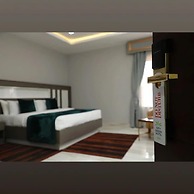 Elegant Hotel & Suites by City Green