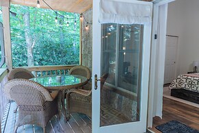Patio & Fireplace: Tranquil Grandfather Mtn Cabin