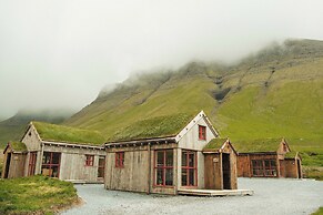Múlafossur Cottages near Waterfall