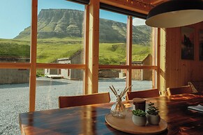 Múlafossur Cottages near Waterfall