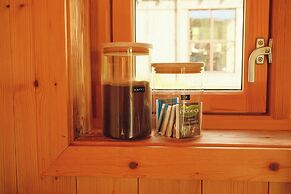 Múlafossur Cottages near Waterfall