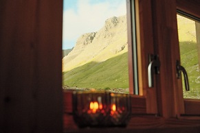 Múlafossur Cottages near Waterfall