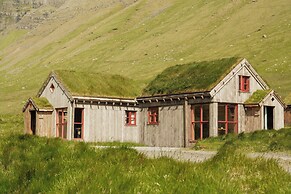 Múlafossur Cottages near Waterfall