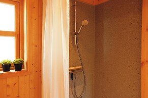 Múlafossur Cottages near Waterfall