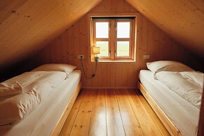 Múlafossur Cottages near Waterfall