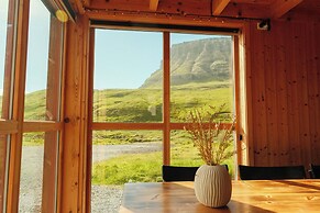 Múlafossur Cottages near Waterfall