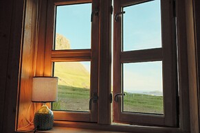 Múlafossur Cottages near Waterfall