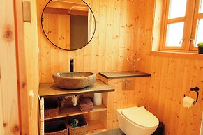 Múlafossur Cottages near Waterfall